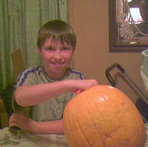 calebwithpumpkin.jpg